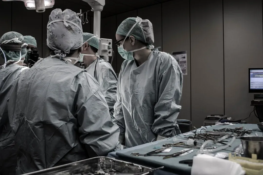 medical staff attending to a patient in a hospital naturally
